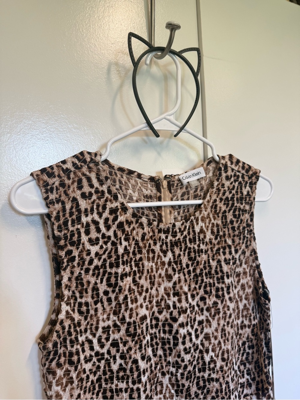New Calvin Klein Leopard Print Sleeveless jumpsuit - flared legs. Sexy. Comfy.